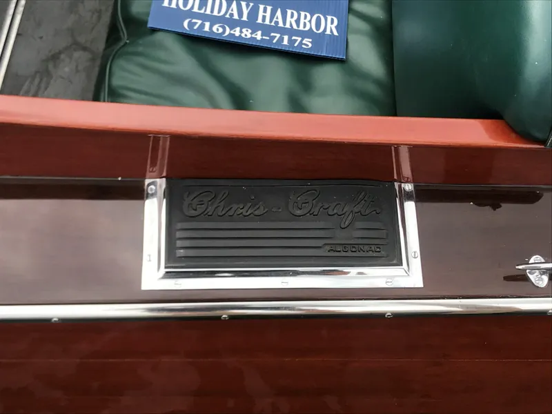 Slide: The Image of 1930 Chris-Craft Triple boat with polished wood and green leather seats. - 14