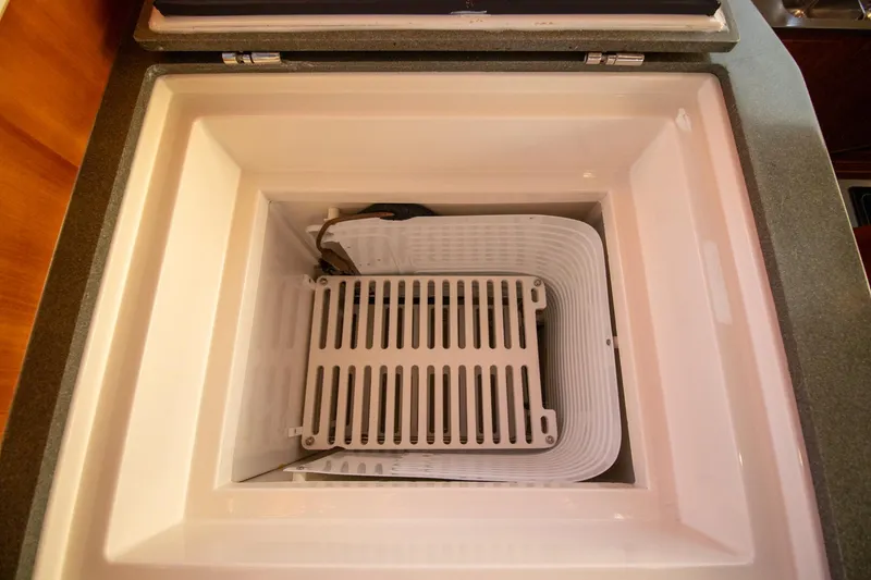 Slide: The Image of Built-in cooler compartment on 2004 Antares PDQ 44 yacht. - 42