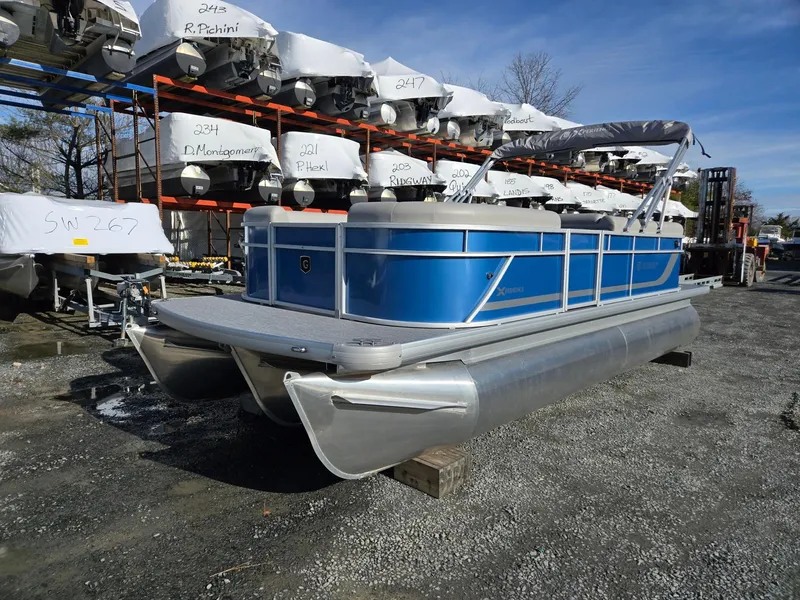 The Image of 2025 Godfrey Xperience Cruise 2086 CX pontoon boat in storage yard. - 0