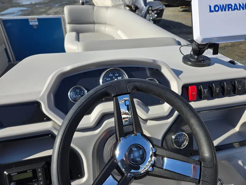 Slide: The Image of Steering console of 2025 Godfrey Xperience Cruise 2086 CX boat with navigation equipment. - 14