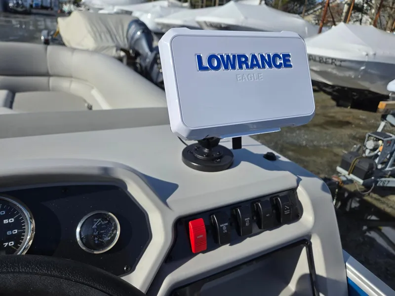 Slide: The Image of Dashboard of 2025 Godfrey Xperience Cruise 2086 CX with Lowrance navigation system. - 16