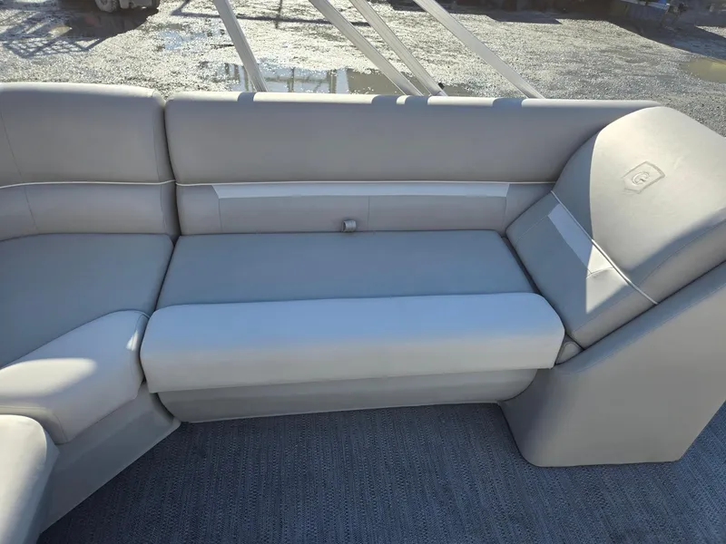 Slide: The Image of 2025 Godfrey Xperience Cruise 2086 CX boat seating, featuring sleek gray upholstery. - 22