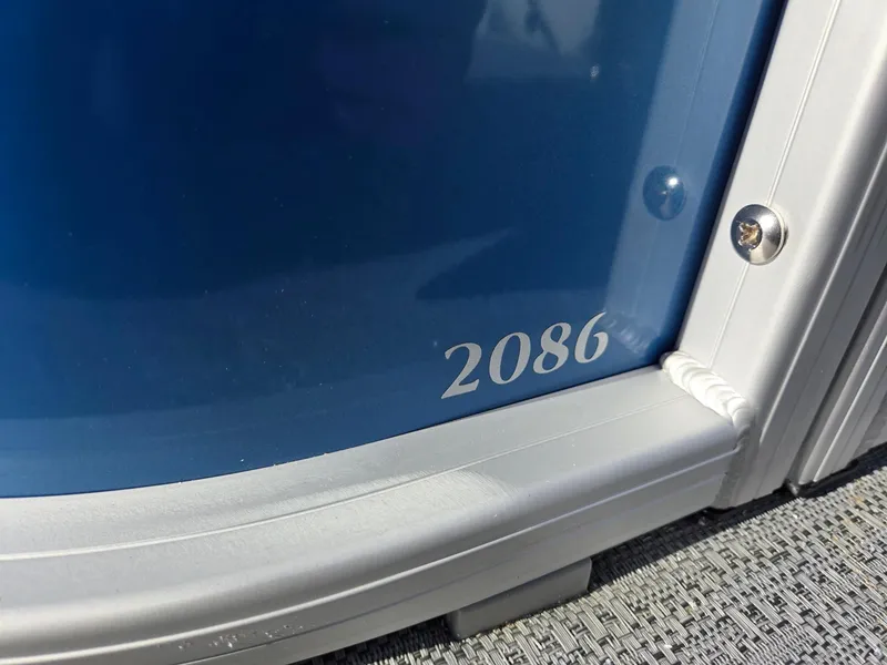 Slide: The Image of Close-up of Godfrey Xperience Cruise 2086 CX, 2025 model, blue panel detail. - 36