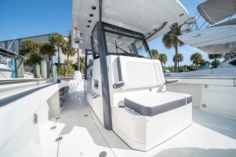 Slide: The Image of 2022 World Cat 400 CC-X boat with sleek design and spacious seating. - 14