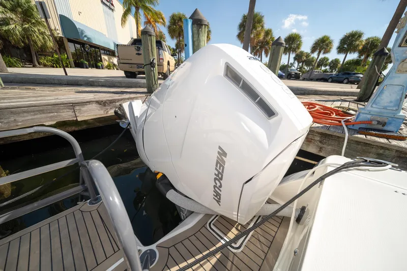 Slide: The Image of 2022 World Cat 400 CC-X with Mercury outboard engine at dockside. - 34