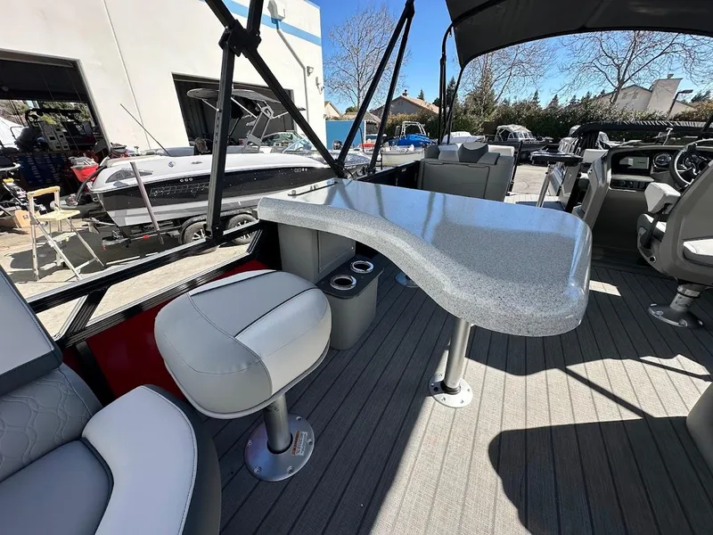 Slide: The Image of 2025 Tahoe Pontoon 2585 LTZ Entertainer with sleek interior and modern seating. - 14