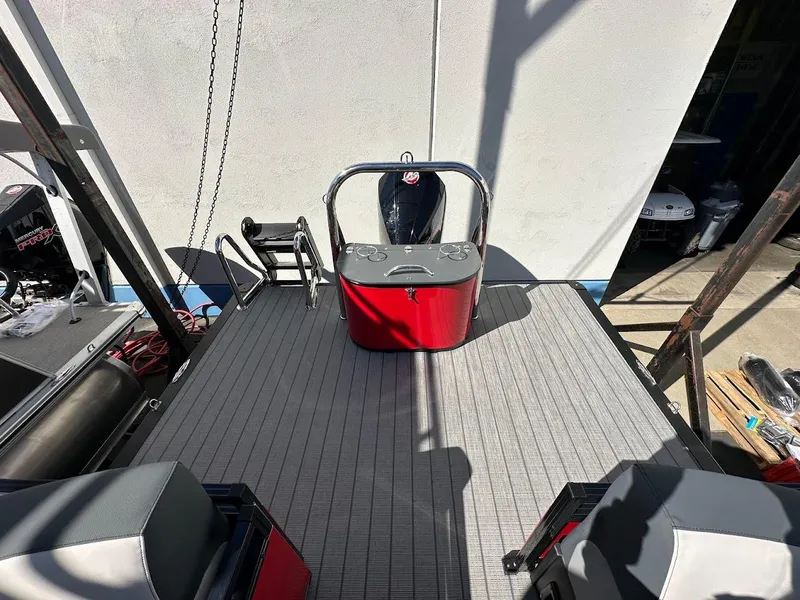 Slide: The Image of 2025 Tahoe Pontoon 2585 LTZ Entertainer deck with seating and ladder. - 15