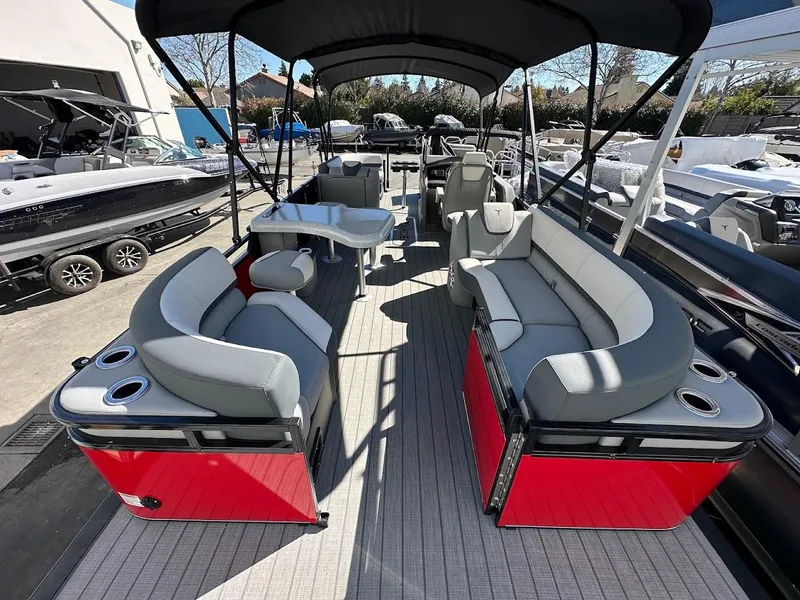 Slide: The Image of 2025 Tahoe Pontoon 2585 LTZ Entertainer with spacious seating and sleek design. - 18