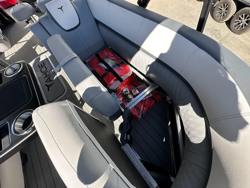 Slide: The Image of 2025 Tahoe Pontoon 2585 LTZ Entertainer interior with storage and seating. - 33