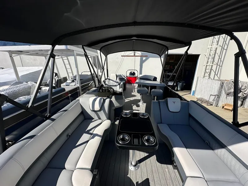 Slide: The Image of 2025 Tahoe Pontoon 2585 LTZ Entertainer with spacious seating and sleek design. - 5