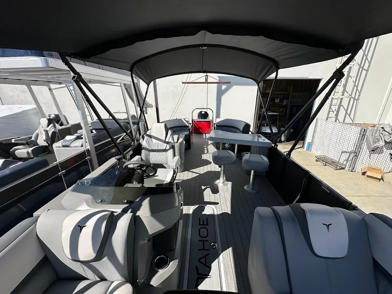Slide: The Image of 2025 Tahoe Pontoon 2585 LTZ Entertainer with spacious seating and modern design. - 6