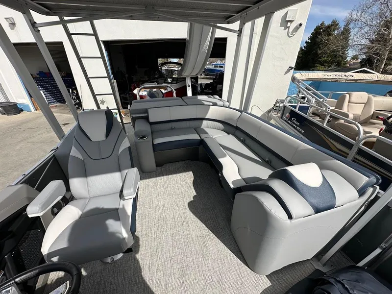 Slide: The Image of 2025 Tahoe Pontoon Cascade Cruise Funship interior with plush seating and modern design. - 13