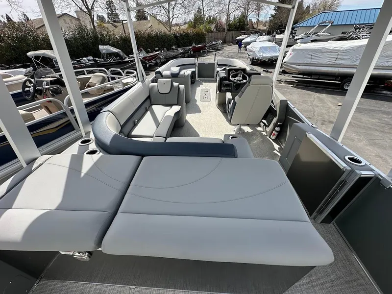 Slide: The Image of 2025 Tahoe Pontoon Cascade Cruise Funship with spacious seating and modern design. - 20