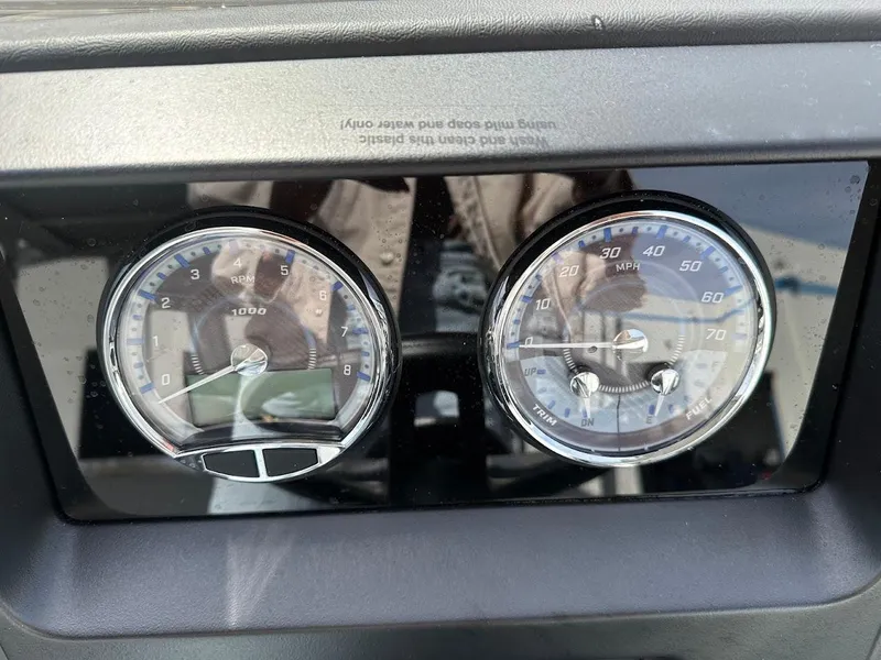 Slide: The Image of Dashboard gauges of 2025 Tahoe Pontoon Cascade Cruise Funship, showing RPM and speed. - 24