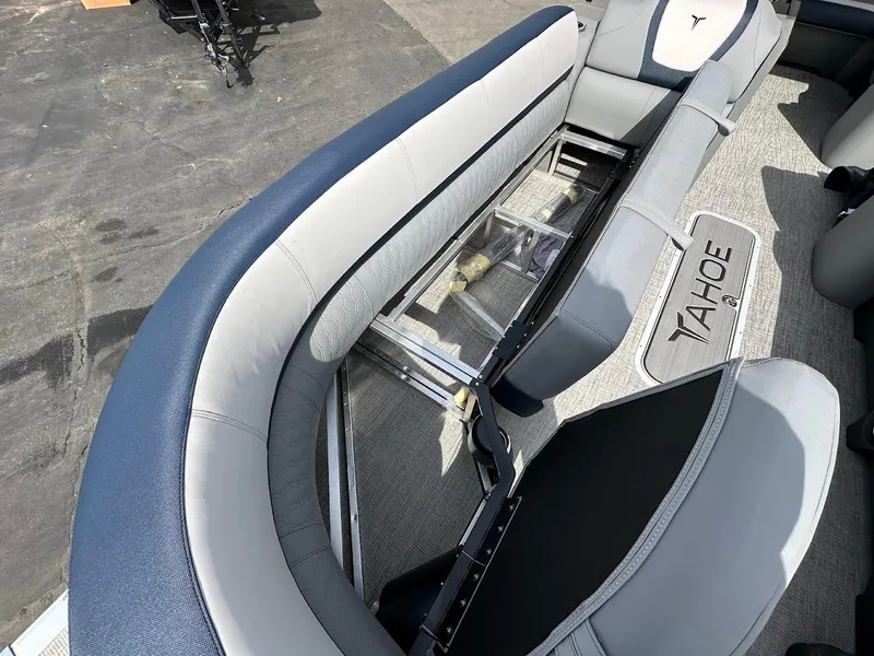Slide: The Image of 2025 Tahoe Pontoon Cascade Cruise Funship interior seating with sleek design and comfortable upholstery. - 31