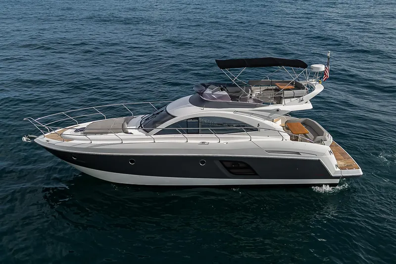 Slide: The Image of 2017 Beneteau Gran Turismo 49 Fly yacht cruising on open water. - 22