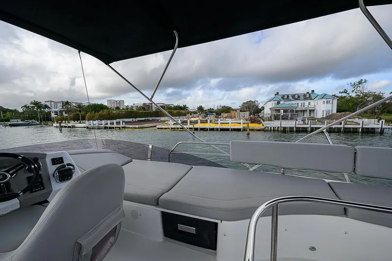 Slide: The Image of 2017 Beneteau Gran Turismo 49 Fly yacht interior with waterfront view. - 24