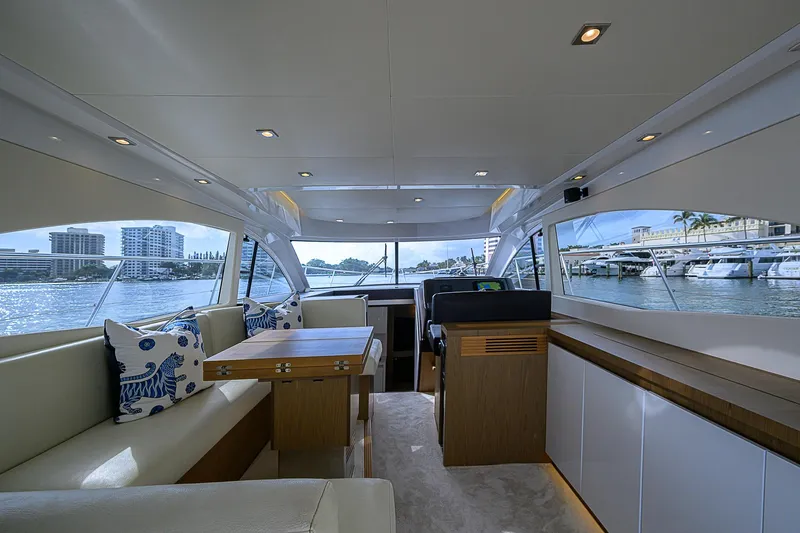 Slide: The Image of Luxurious interior of 2017 Beneteau Gran Turismo 49 Fly yacht with waterfront view. - 25