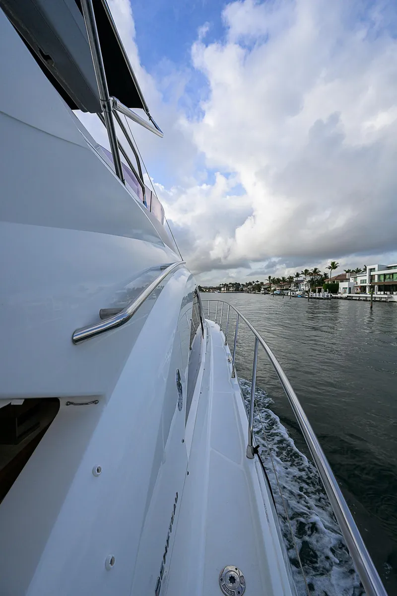 Slide: The Image of 2017 Beneteau Gran Turismo 49 Fly cruising on a scenic waterway. - 37