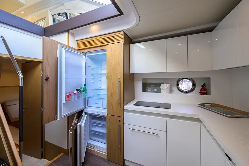 Slide: The Image of Modern kitchen interior of 2017 Beneteau Gran Turismo 49 Fly yacht. - 45