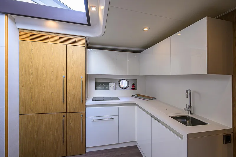 Slide: The Image of Modern kitchen interior on 2017 Beneteau Gran Turismo 49 Fly yacht. - 46
