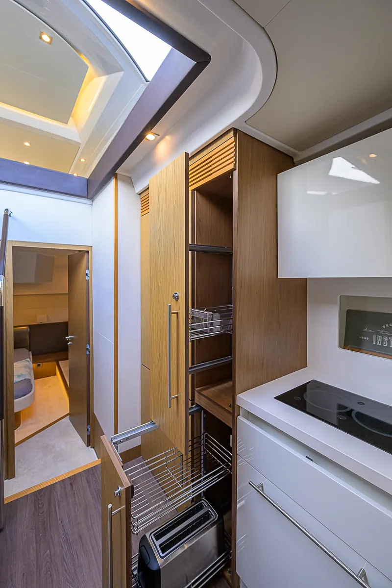 Slide: The Image of Modern kitchen interior of 2017 Beneteau Gran Turismo 49 Fly yacht. - 51