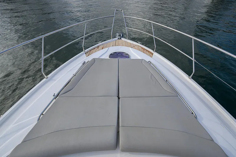 Slide: The Image of 2017 Beneteau Gran Turismo 49 Fly yacht bow with sunbathing cushions. - 6