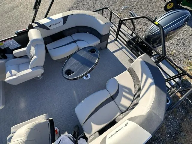 Slide: The Image of 2025 Starcraft SLS 1 boat interior with seating and table, top view. - 5