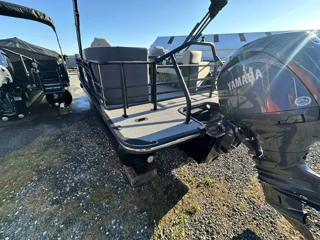 Slide: The Image of 2025 Starcraft SLS 1 pontoon boat with Yamaha outboard motor. - 7