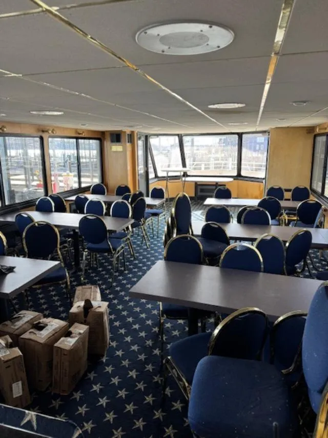 Slide: The Image of 1994 Skipperliner 5800 kitchen with sink, cabinets, and microwave. - 19