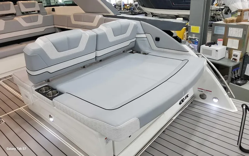 Slide: The Image of 2024 Formula 430 Super Sport Crossover boat with spacious rear seating and modern design. - 13