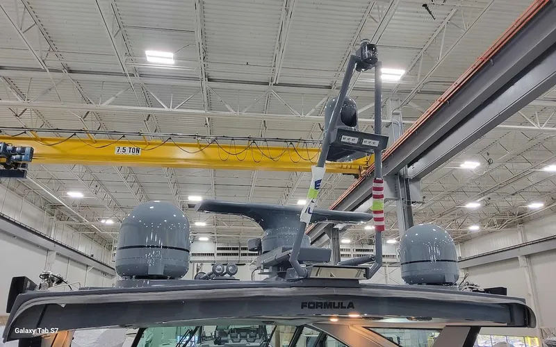 Slide: The Image of 2024 Formula 430 Super Sport Crossover in a warehouse, showcasing advanced radar equipment. - 15