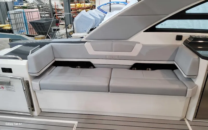 Slide: The Image of 2024 Formula 430 Super Sport Crossover interior seating, sleek gray upholstery. - 16