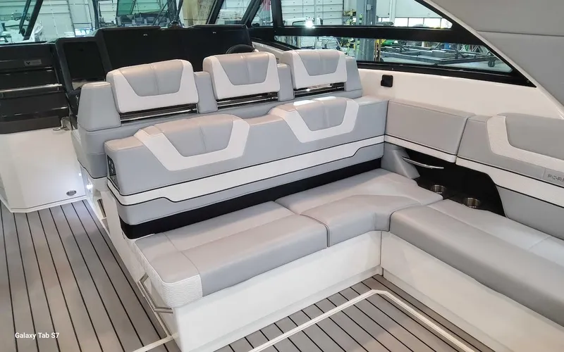 Slide: The Image of Luxurious seating in 2024 Formula 430 Super Sport Crossover boat interior. - 19