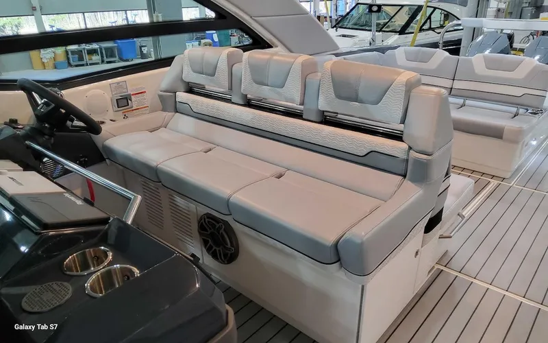 Slide: The Image of 2024 Formula 430 Super Sport Crossover luxury boat interior with plush seating. - 23