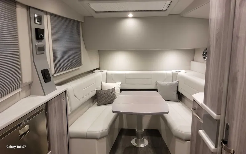 Slide: The Image of Luxurious interior of 2024 Formula 430 Super Sport Crossover with modern seating and table. - 34