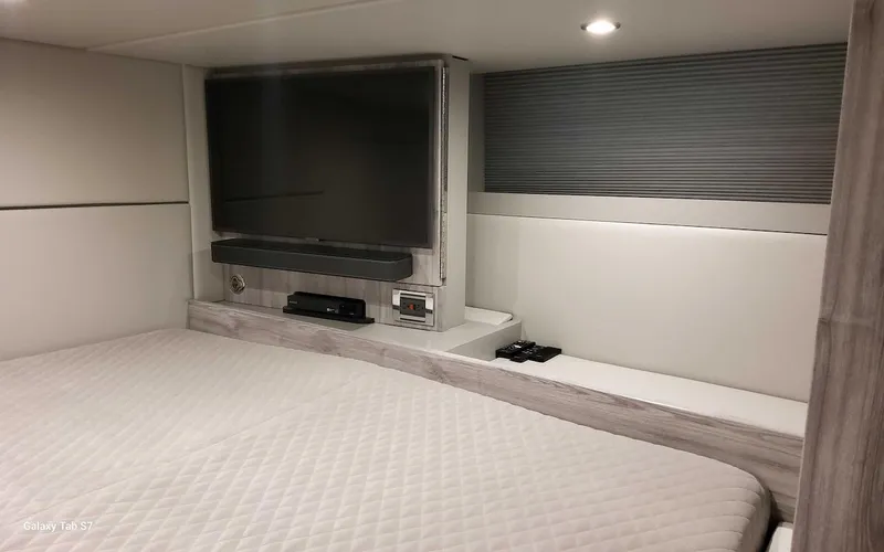 Slide: The Image of 2024 Formula 430 Super Sport Crossover cabin with TV and modern interior design. - 39