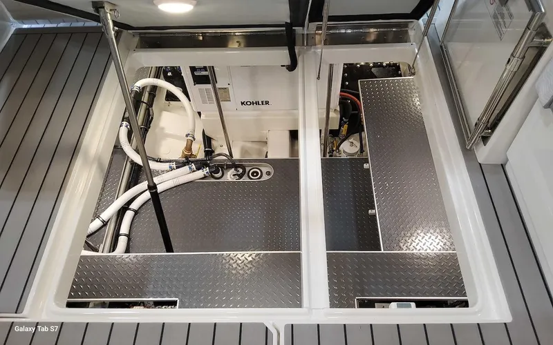 Slide: The Image of Engine compartment of 2024 Formula 430 Super Sport Crossover with Kohler generator. - 42