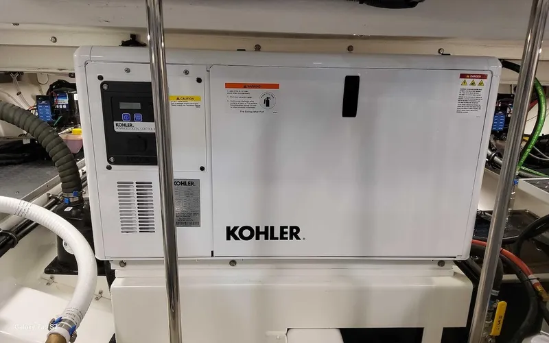 Slide: The Image of Kohler generator in 2024 Formula 430 Super Sport Crossover engine room. - 43