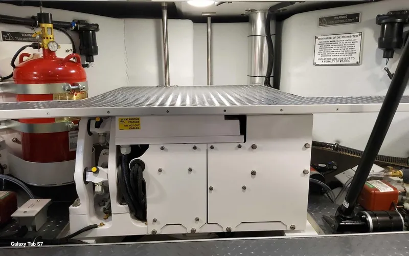 Slide: The Image of Engine room of 2024 Formula 430 Super Sport Crossover with fire extinguisher and equipment. - 44