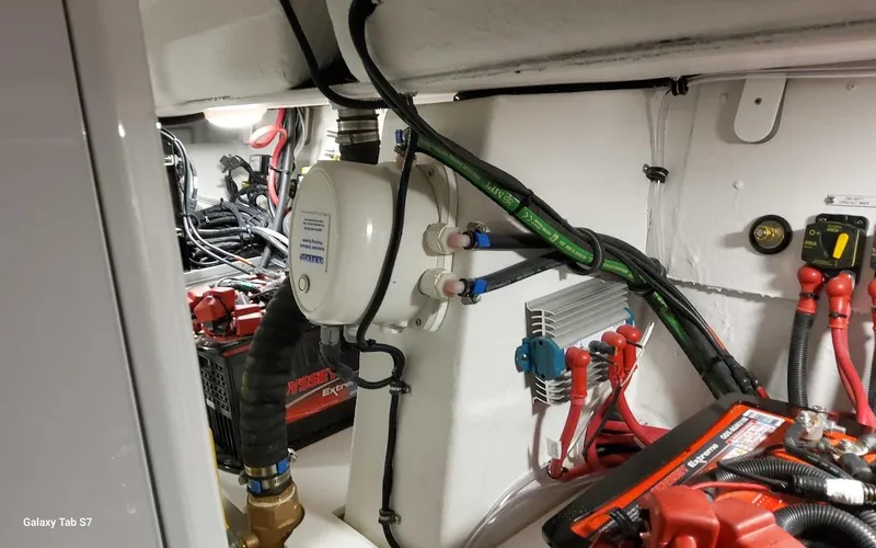 Slide: The Image of Engine room of 2024 Formula 430 Super Sport Crossover with wiring and components. - 48