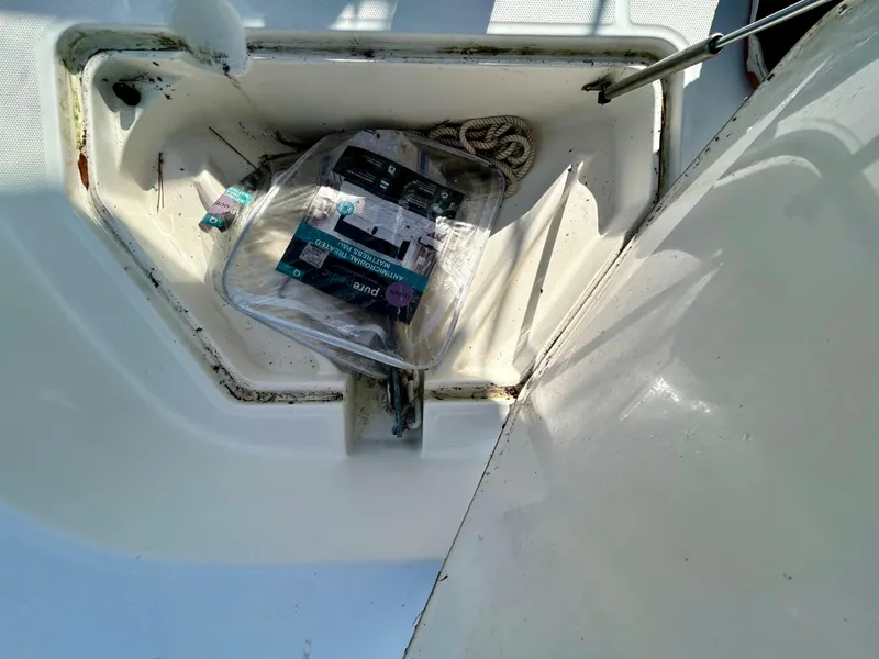 Slide: The Image of Storage compartment on a 2011 Boston Whaler DAUNTLESS 180/CC boat. - 9