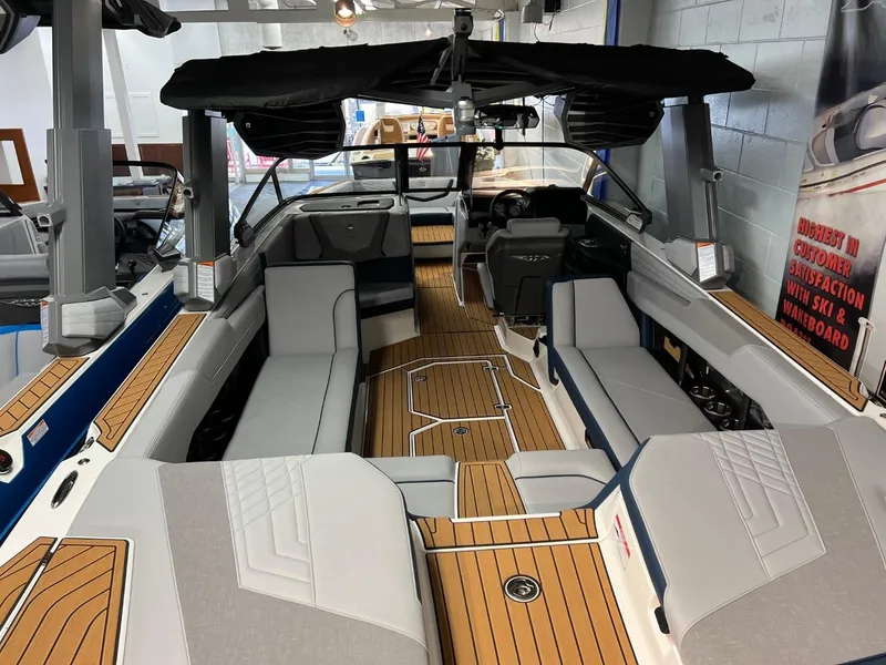 Slide: The Image of 2023 Nautique Super Air Nautique G25 interior with sleek seating and modern design. - 10