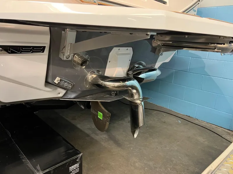 Slide: The Image of 2023 Nautique Super Air Nautique G25 boat exhaust and propeller detail. - 5