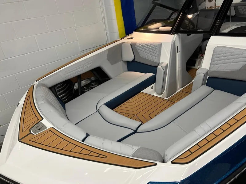Slide: The Image of 2023 Nautique Super Air Nautique G25 interior with luxurious seating and modern design. - 6
