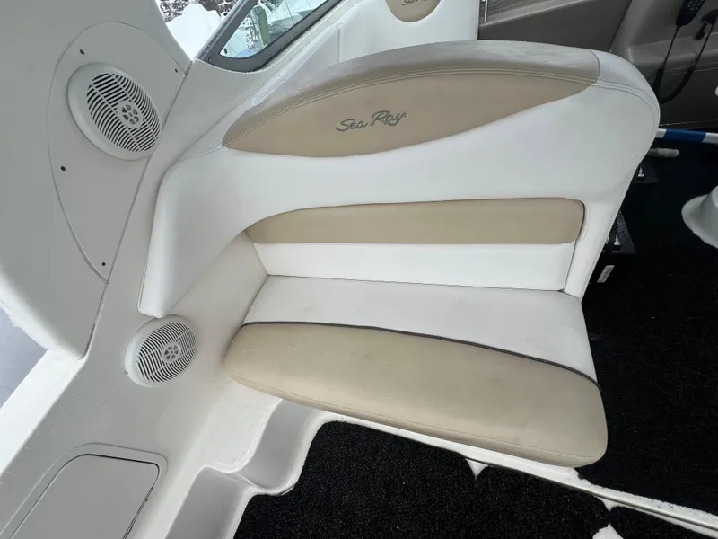 Slide: The Image of 2008 Sea Ray 280 Sundancer boat seat with beige and white upholstery. - 16