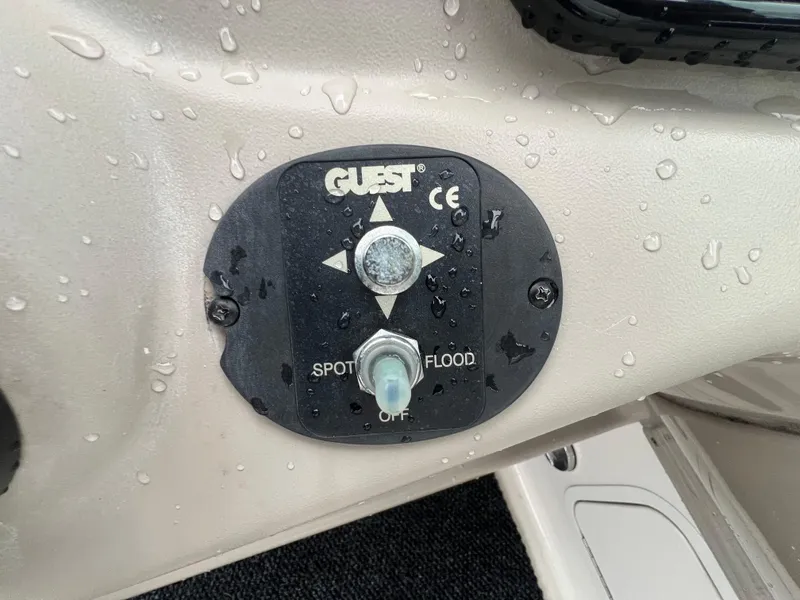 Slide: The Image of Control panel for spotlight and floodlight on 2008 Sea Ray 280 Sundancer boat. - 7