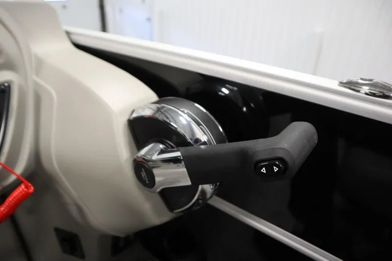 Slide: The Image of Throttle control of 2025 Trifecta 24RF LE 2.75 boat, featuring sleek design and ergonomic handle. - 27
