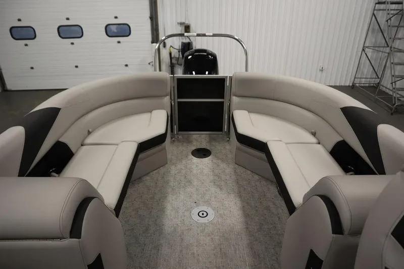 Slide: The Image of 2025 Trifecta 24RF LE 2.75 pontoon boat interior with plush seating and modern design. - 28