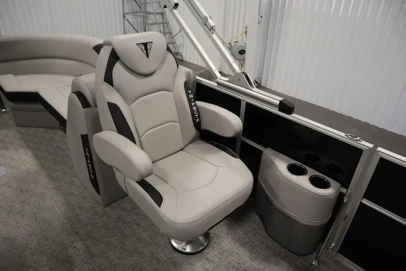 Slide: The Image of Luxurious seating on 2025 Trifecta 24RF LE 2.75 pontoon boat with cup holders. - 29